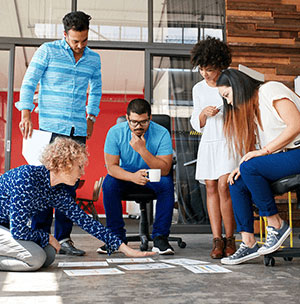 change_management_consulting a group of consultants discussing the best change management approach